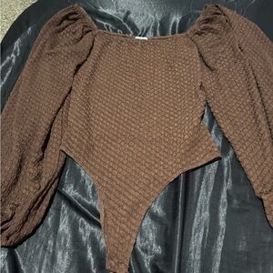 Brown body suit